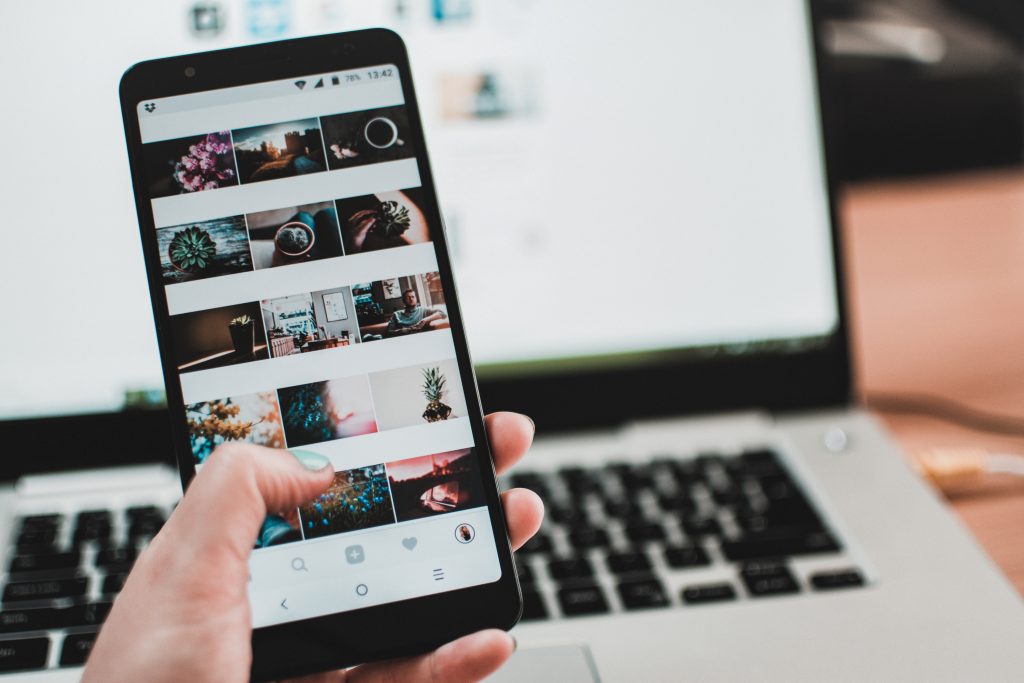 Social media presence on mobile and laptop